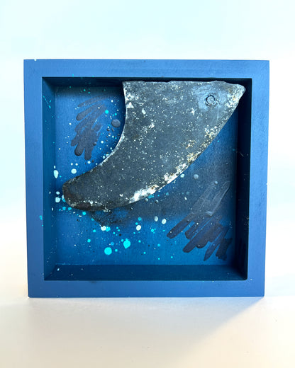 Decorative surf fin sculpture in a blue frame 